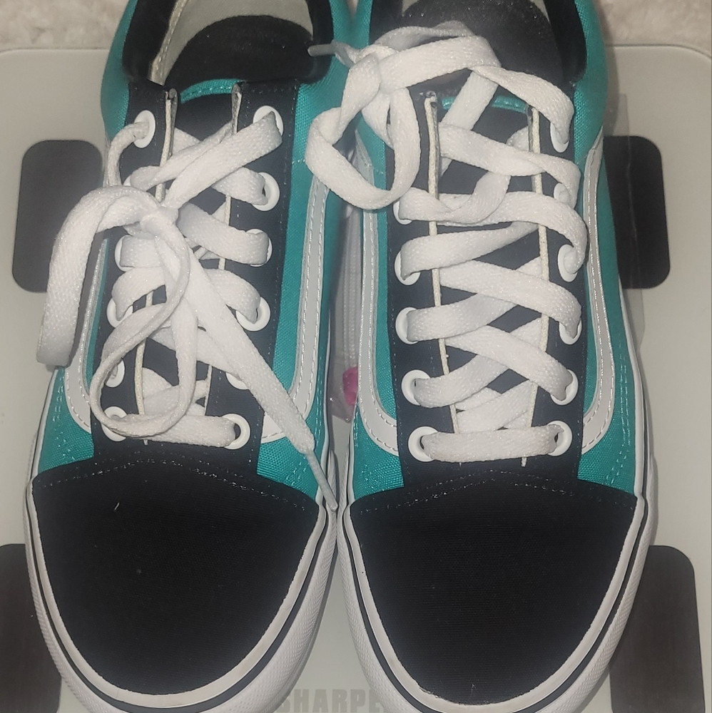 Like new. Custom Vans teal/white/black platform.  W size 7.5.